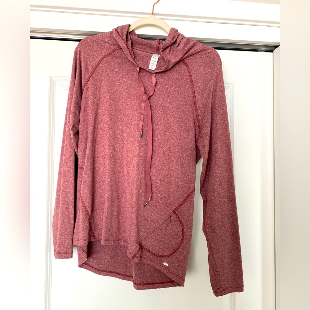 Two woman’s medium pullovers workout material